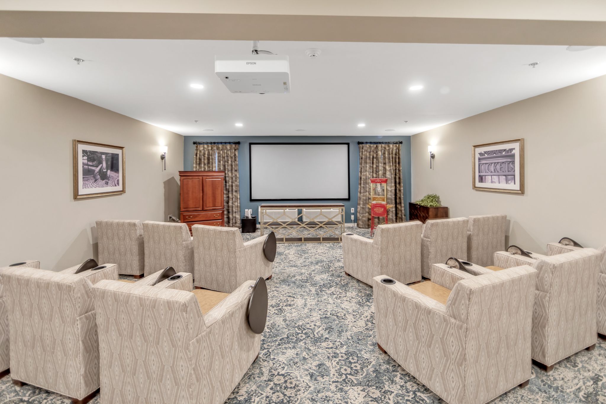 Movie room with projection screen at Parkrose Estates, a trusted choice for senior living near Fayetteville, NY.